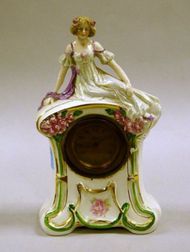 Figural Ceramic Mantel Clock. 